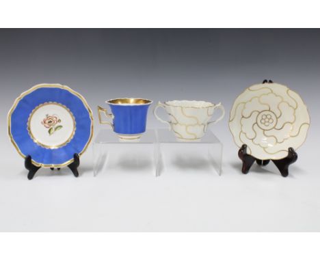 18th century English chocolate cup and saucer, white glazed with  scrolling gilt pattern in the manner of James Giles, bearin