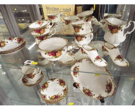 Royal Albert - a six place setting tea service decorated in the Old Country Roses pattern comprising 23 pieces