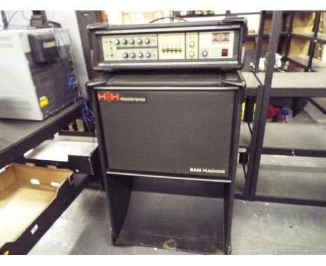 An H & H 250 watt base amplifier and speaker cabinet, Mos-Fet technology, model Bass Machine serial No. 2316 and Bass speaker