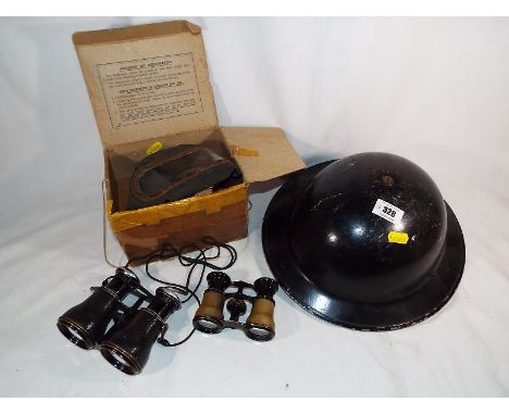 A military helmet, a respirator / gas mask, a pair of binoculars and a pair of brass opera glasses  (4)
