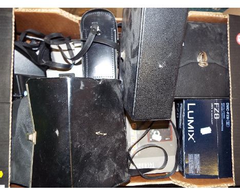 A box containing a large collection of vintage cameras and binoculars to include Lumix, Technaxx, Polaroid Land camera, Polar