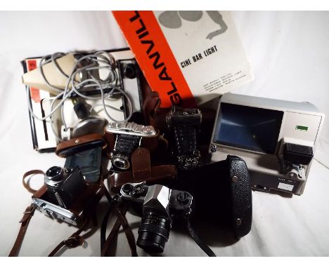 A good mixed lot of photographic equipment to include an Asahi Pentax SP1000 camera, serial No. 5710404 in soft case, a canti