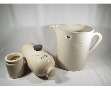 A collection of stoneware to include a Hathernware Ltd jug, foot warmer and a jar (3)