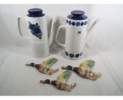 A J and G Studio Meakin tea pot, a blue mood earthen ware tea pot and a set of three graduated Keel Street pottery ducks (qty