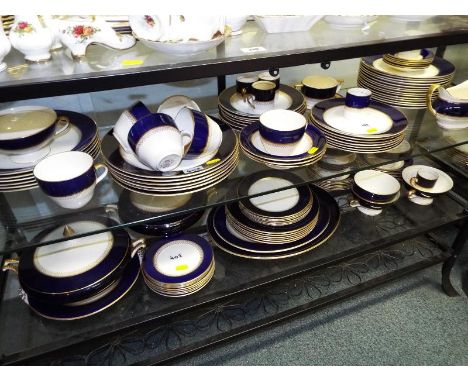 Simpsons Ambassador table ware, approx 111 pieces, cobalt blue with gilded highlights and one Royal Worcester side plate deco