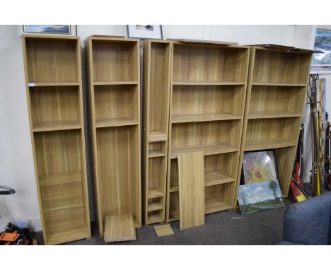 SUITE OF FIVE VARIOUS LIGHT WOOD FINISH MODERN BOOKCASES, VARIOUS WIDTHS