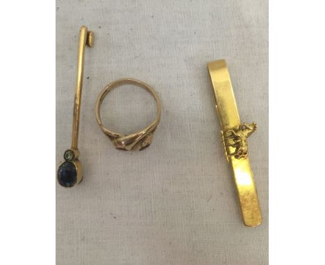 A heavy 18ct gold tie pin; together with a gold ring and one other tie pin