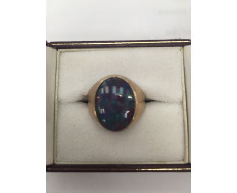 A 9ct gentleman's black opal (doublet) ring