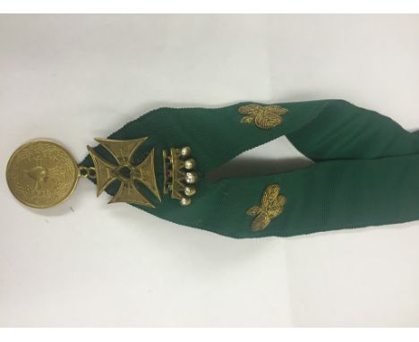 Friendly Brothers of St Patricks: a rare medal with green sash embroidered with shamrocks: formerly the property of Sir Gough