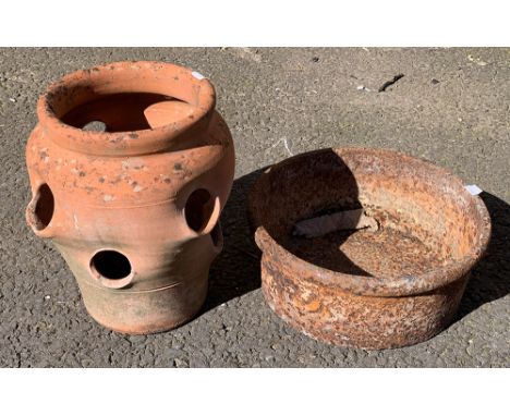 A terracotta strawberry planter, 31cmH; together with an iron pot, 33cmD 