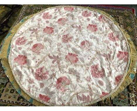 A circular lined table cover, possibly a Colefax &amp; Fowler print, 215cmD 