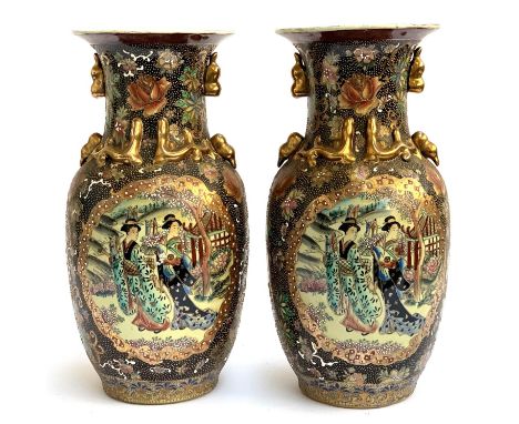 A pair of large Japanese vases depicting Geishas, heightened in gilt with textured enamel decoration, 47.5cmH 