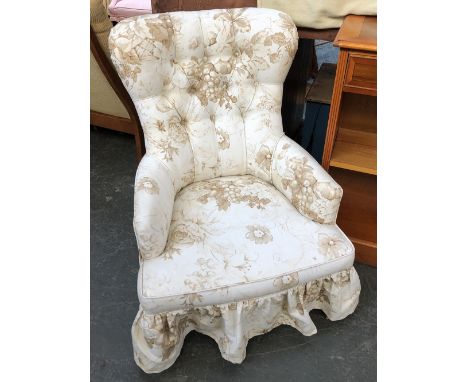 A 20th century button back bedroom armchair, 62cmW the seat 35cmH 