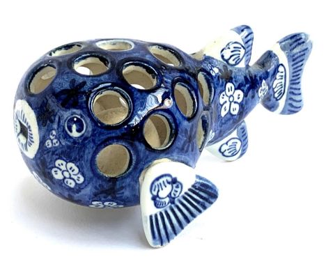 A ceramic Delft puffer fish incense holder, 11cmL 