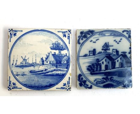 Two 18th/19th century Dutch Delft tiles of village scenes, one with sailing boats &amp; barge 