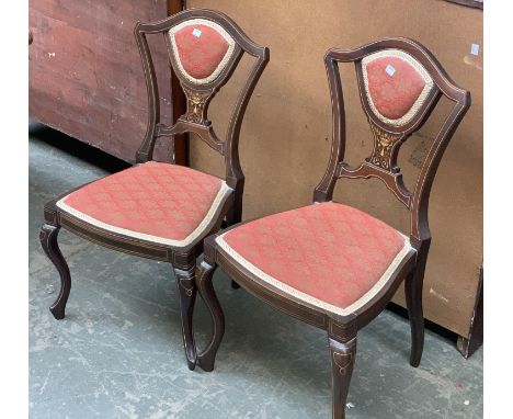 A pair of mahogany and inlaid bedroom chairs, each bearing label for Jas. Shoolbred &amp; Co, Tottenham Court Road, London 