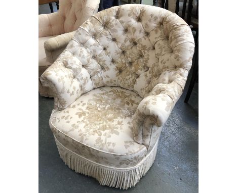 A 20th century button back bedroom chair, in a cream floral print 