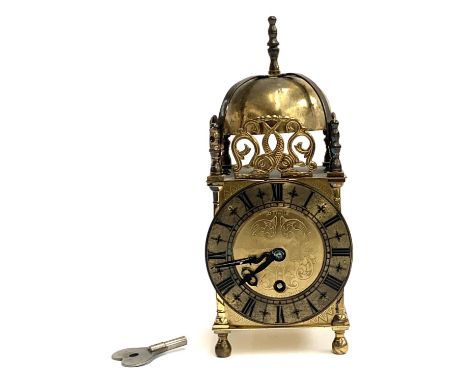 A 20th century brass cased replica lantern clock by Smiths, 7 jewel movement, 24cmH 