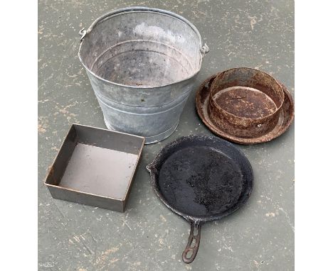 A galvanised bucket, a square loaf tin, cast iron skillet, and one other item (4) 