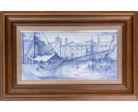 A blue and white Delft style tile depicting ships in a European port, 20x40cm 