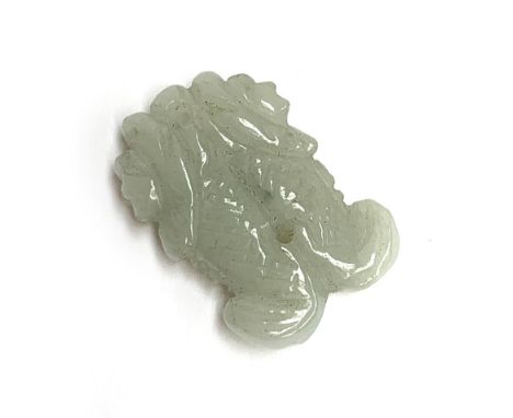 A Chinese carved celadon jade pendant in the form of two fish, 3.3cmL 