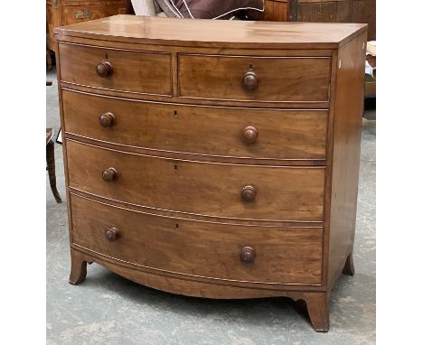 A 19th century mahogany and crossbanded bowfront chest, of two short over three graduating drawers, turned wooden knobs, shap