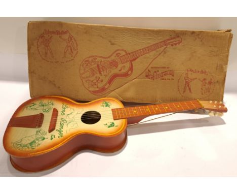 Jefferson, a boxed 1959 Lone Ranger Toy Guitar. One string appears Missing, condition appears Fair to Fair Plus within Fair b