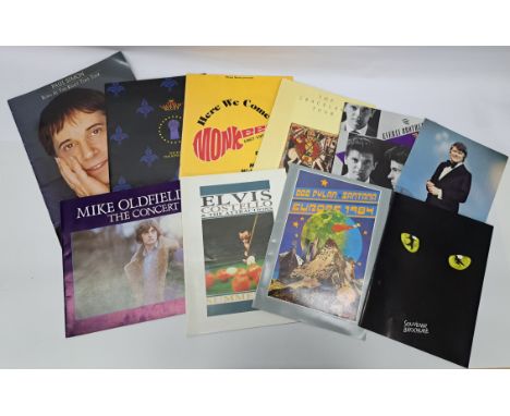A collection of Concert Programmes and Music Mirror Papers to include; Mike Oldfeild The Concert 1980 Programme, Elvis Costel
