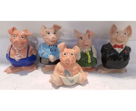 Wade, a unboxed Group of NatWest Piggy Banks. Please note this lot appears to be complete with stoppers. Condition appears Go