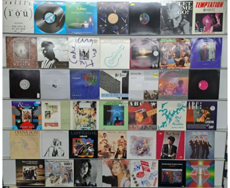 A collection of classic Pop LPs and 12" to include artists; Billy Joel, Paula Abdul, Gloria Estefan, Heaven 17, Bruce Hornsby