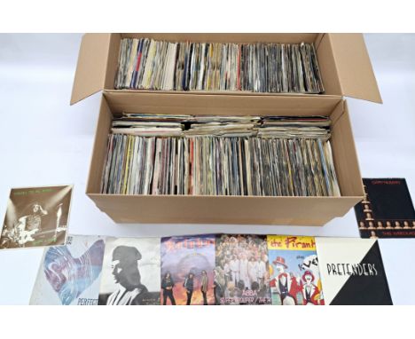 A large collection of mostly 80's rock/pop 7" singles to include artists; Blondie, Spandau Ballet, The Undertones, The Boomto