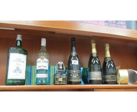 6 bottles of alcohol including gin, rum and cava