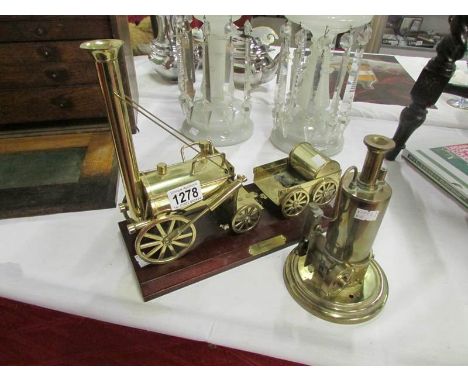 A brass model of Stephenson's rocket and a stationary engine