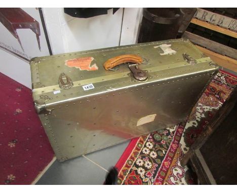 A metal travelling trunk