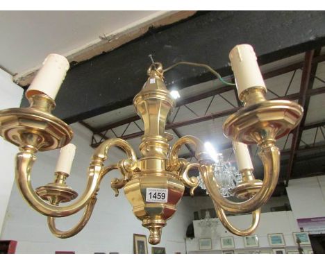 A brass ceiling light