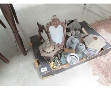 A mixed lot of brass and copper including jelly moulds, wall gas light, motorcycle carbide lamp etc