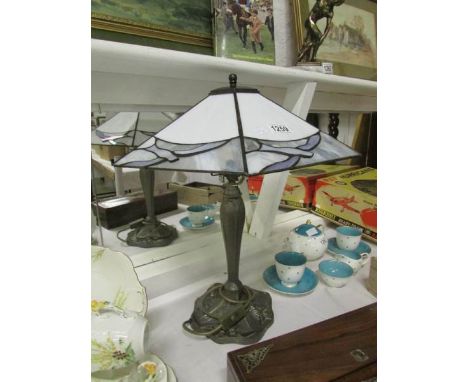 A spelter table lamp with Tiffany style shade