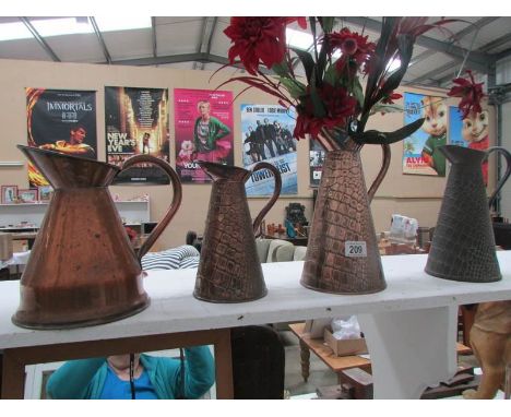 4 Art Deco copper 'lizard skin' jugs by J S Sankey and one other