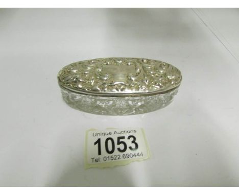 A silver topped trinket pot, Hallmarked Birmingham 1912/13