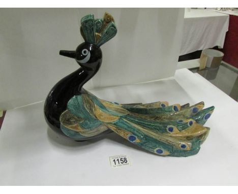 A Salim Goebel 1984 peacock