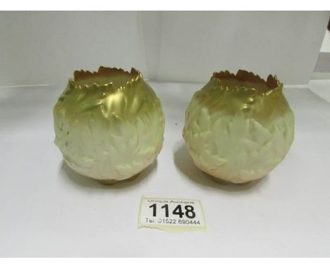 A pair of Royal Worcester fern vases