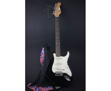 Tanglewood stratocaster style electric guitar in black.  Comes with soft gig bag carry case.