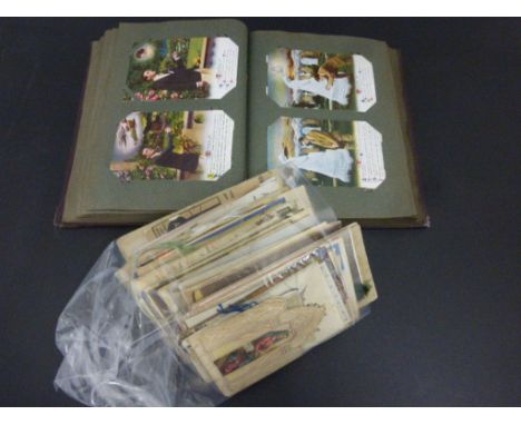 Collection of vintage cards and religious postcards including an album featuring 2 x Little Black Me