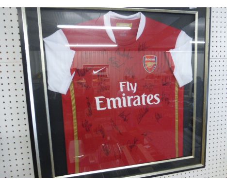 Football Autographs - Framed & glazed Arsenal shirt signed by the 2006/7 squad from the first season at The Emirates