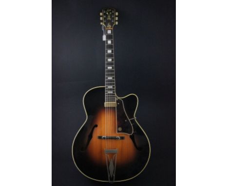 A 1958 Levin 330 guitar.  Serial number 377719.  Originally a fully acoustic version of this classic guitar, with a later add
