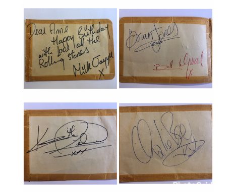 Music Autographs - Autograph book pages signed by The Rolling Stones with dedication from Mick Jagger reading 'Dear Anne Happ