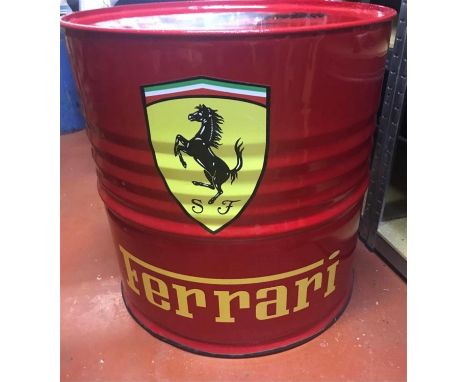 Reduced to table top height and professionally sprayed in Rosso.A Ferrari-homage oil-drum, cut down to size, professionally s