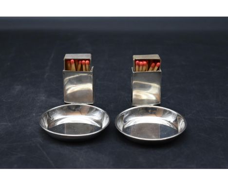A pair of Art Deco silver matchbox holders and trays, London hallmarks, marked Asprey, London. H.7cm 