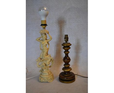 A moulded Eastern style table lamp and a 
baluster turned example. H.42cm (Tallest) 