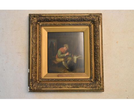 After David Teniers (1610-1694), a gilt framed oil on panel, study of a seated man, bears plaque. H.46 W.44cm 